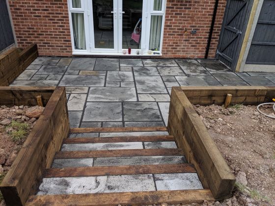 Slabbing and railway sleeper walls in Dudley