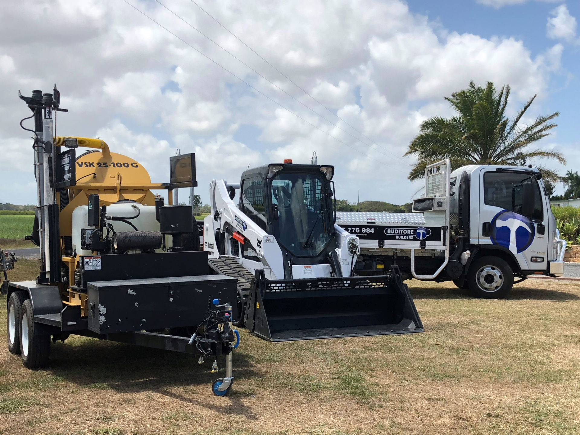 Fleet Of Excavators & Trucks — Builders in Ingham, QLD