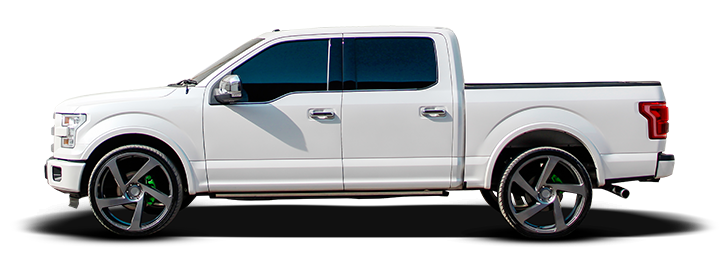 A white pickup truck with black wheels on a white background. | Gary Jackson Motors