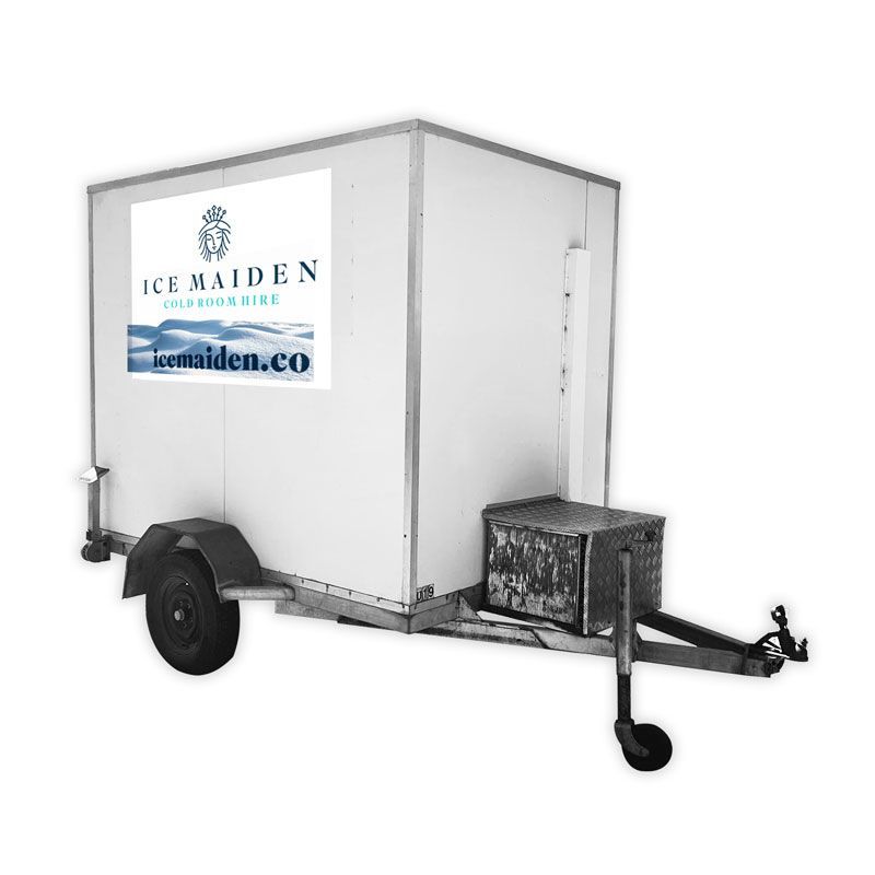 A white trailer with the word ice maiden on it.