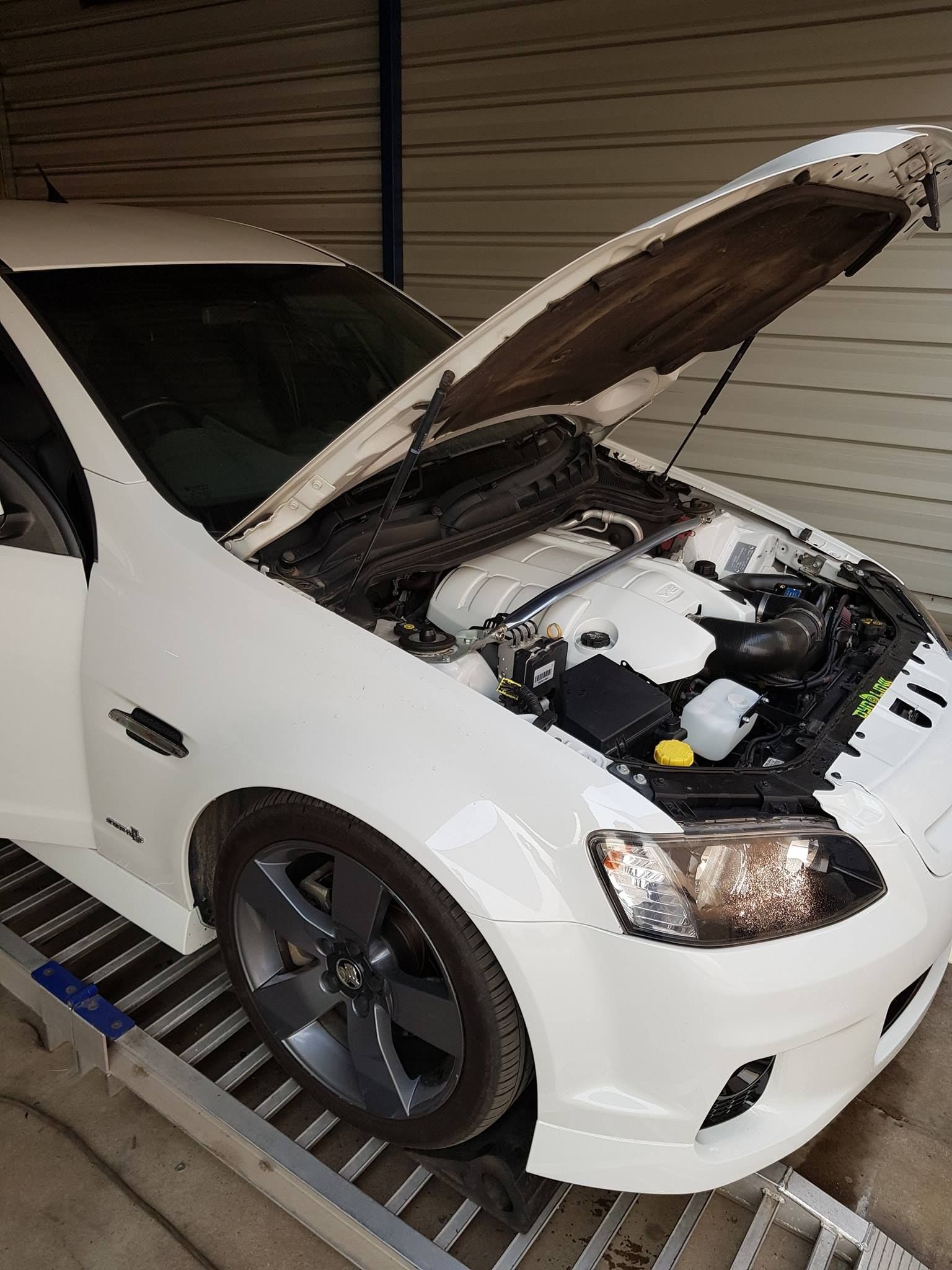 A Close Up Of A White Car Engine — Dynolink In Garbutt, QLD