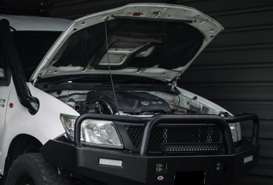A White Ute With A Engine Showing — Dynolink In Garbutt, QLD