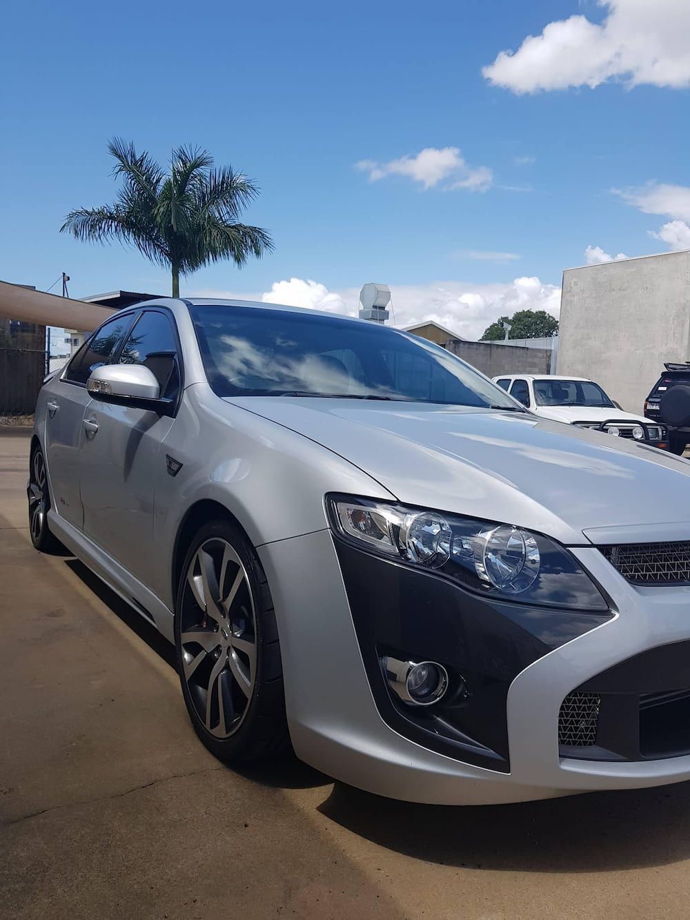 A Silver Car Is Parked In A Parking Lot On A Sunny Day — Dynolink In Garbutt, QLD