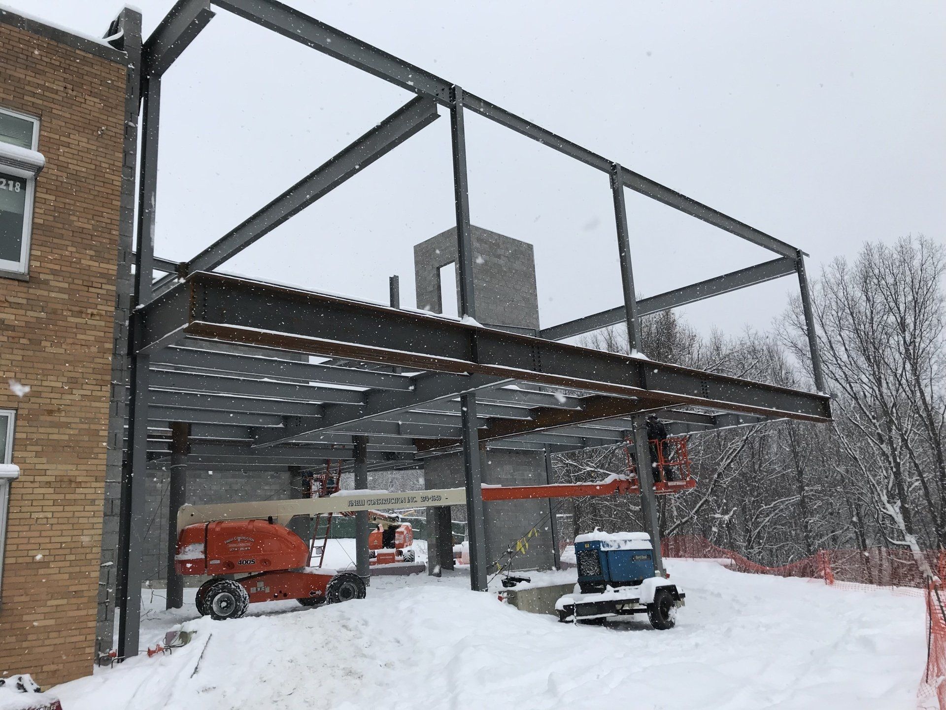 Workers On A High Steel Platform — Troy, NY — Finelli Construction