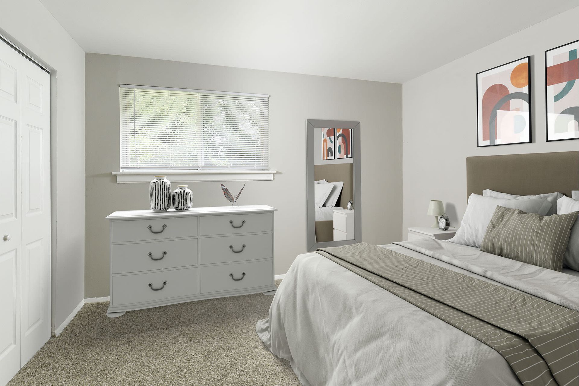 Bedroom with dresser, bed, open window, and artwork on the wall.