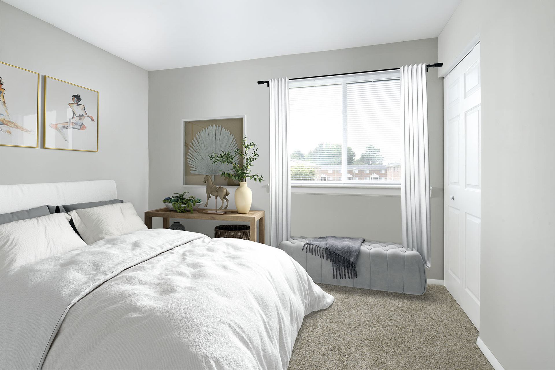 Bedroom with white bedding, gray walls, a window, and decorative art.