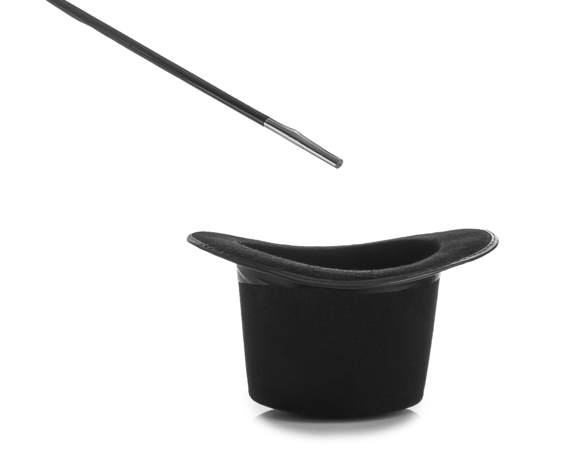 A black top hat with a magic wand sticking out of it