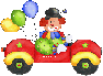 A clown is driving a red car with balloons.