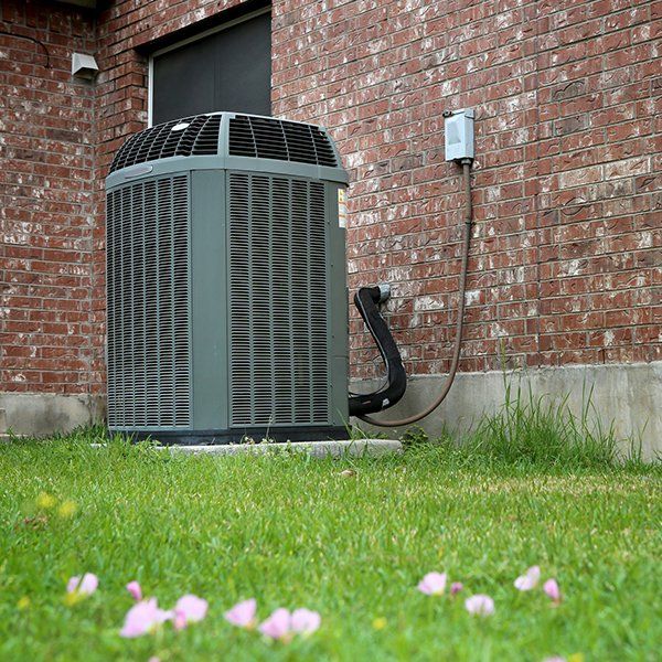 Modern Air Conditioner Units Outside a House — Jonesborough, TN — Newman Air