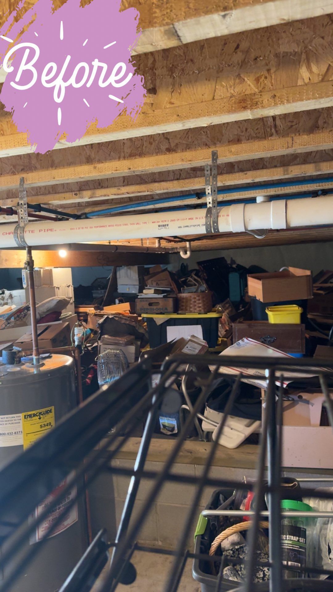 Cluttered garage with boxes, baskets, and shelving, viewed from above.