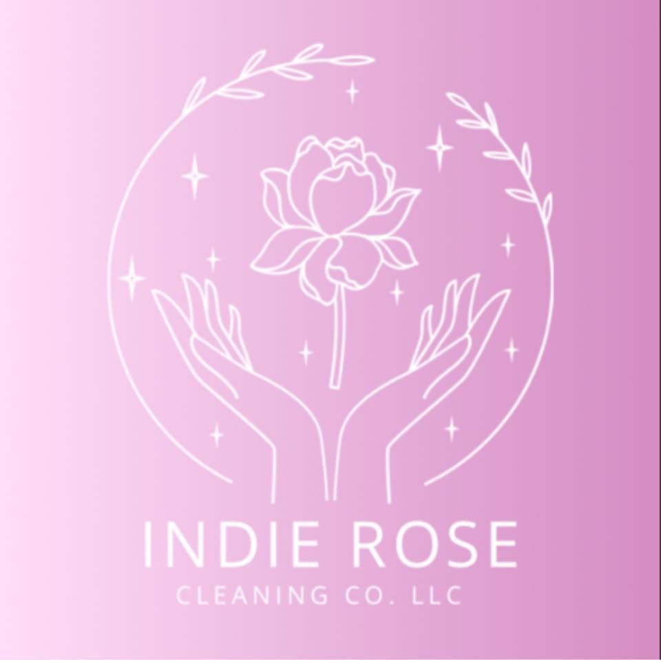 Logo for "Indie Rose Cleaning Co. LLC": white outline of hands holding a flower inside a circle, on a pink background.