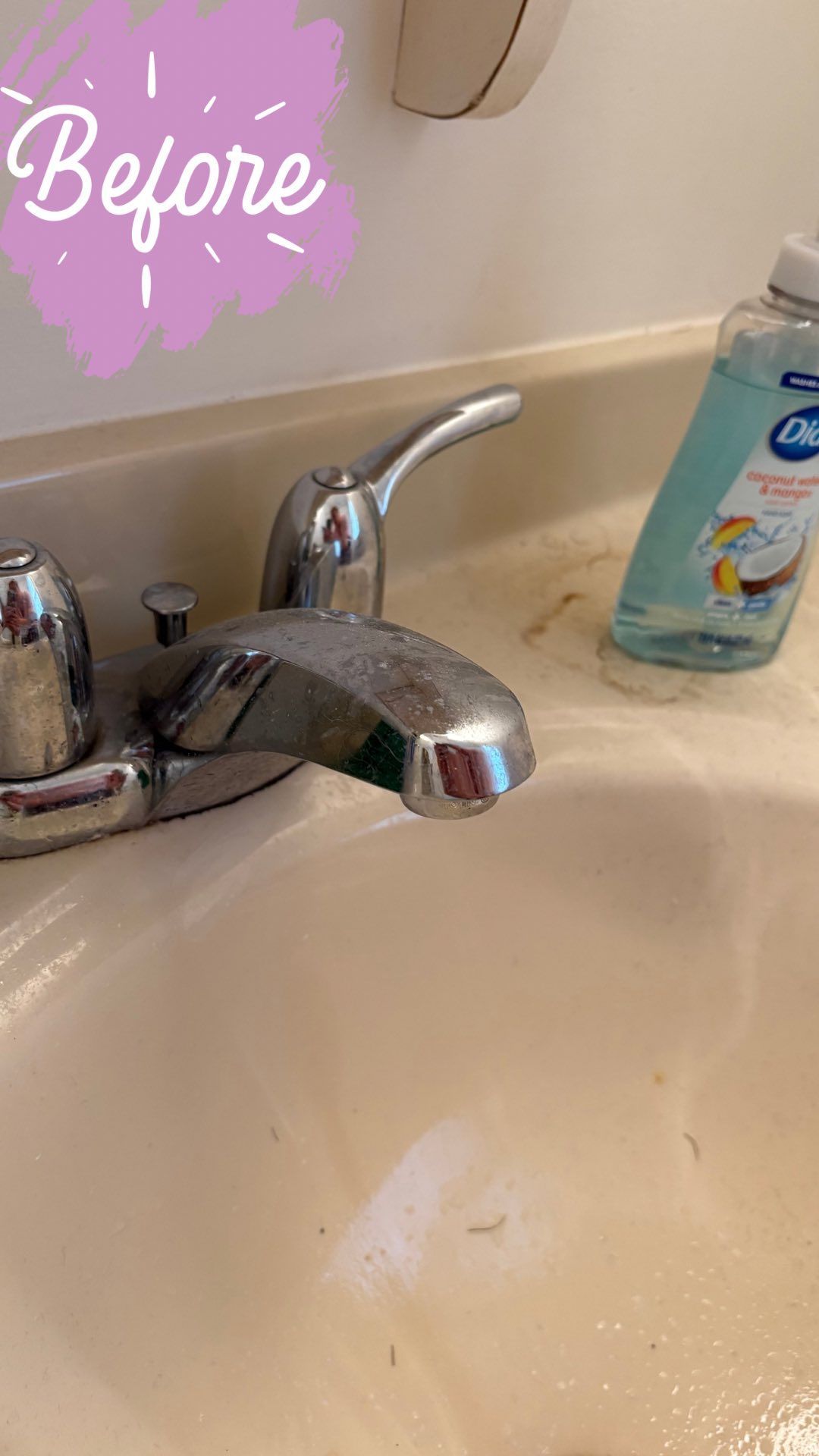 Dirty bathroom sink with faucet and soap bottle.