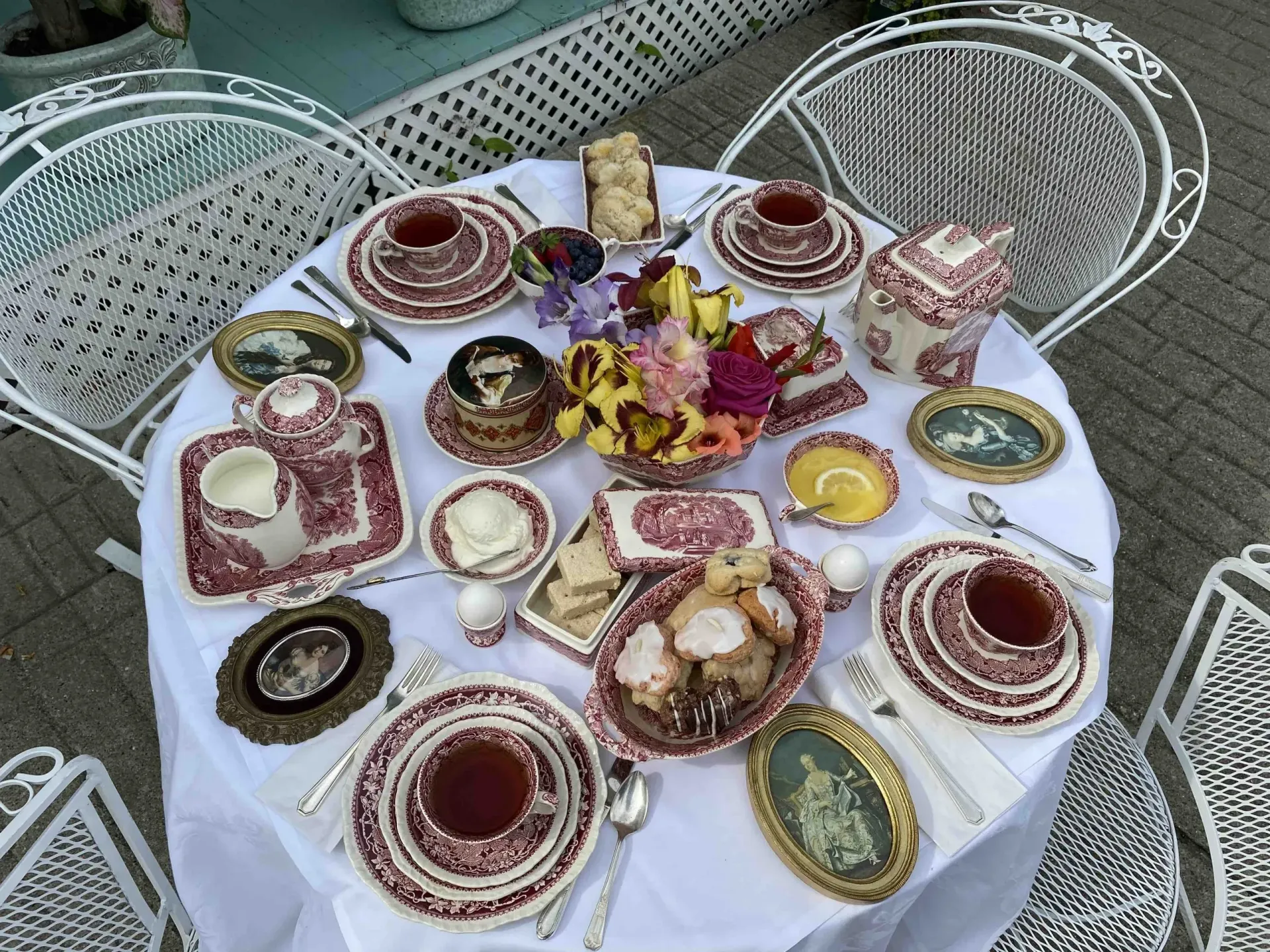 A table with a lot of plates and cups on it