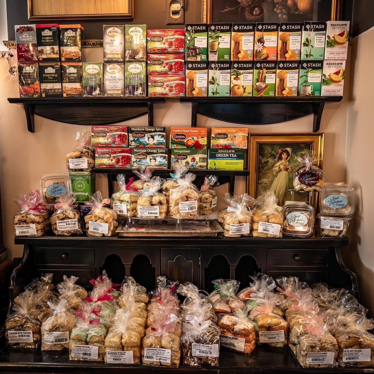 A shelf filled with lots of different types of cookies.
