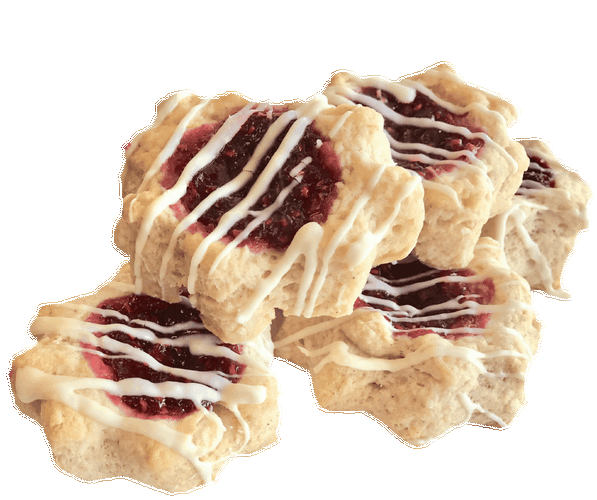 A pile of cookies with raspberry jam and white frosting on a white background.