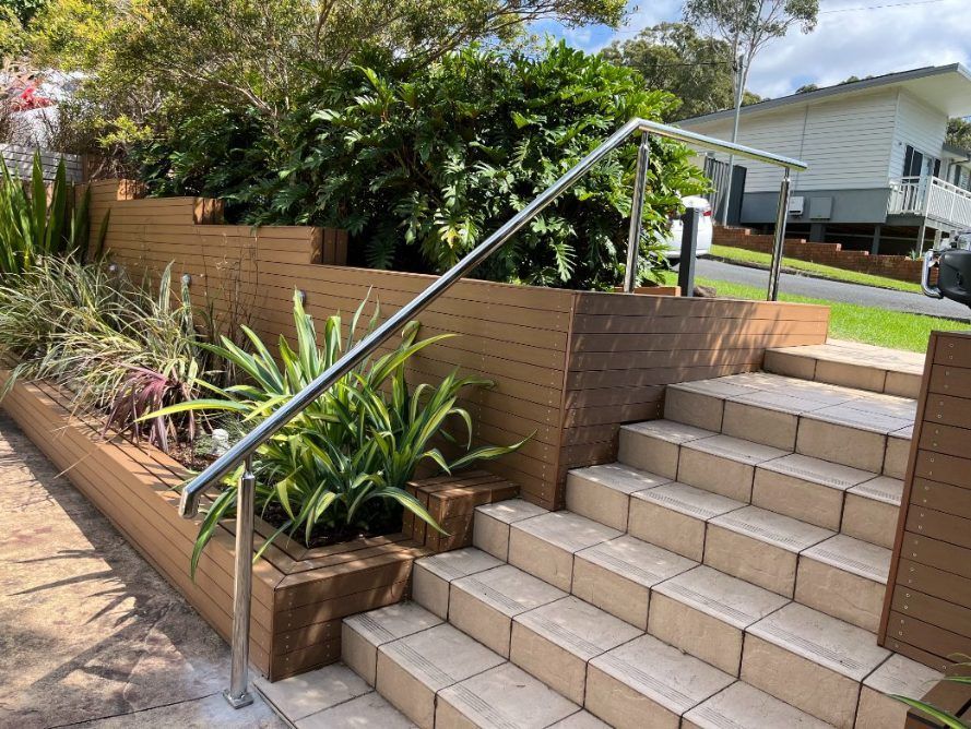 A Set of Stairs With a Stainless Steel Railing — Febos Welding and Engineering In Corrimal, NSW
