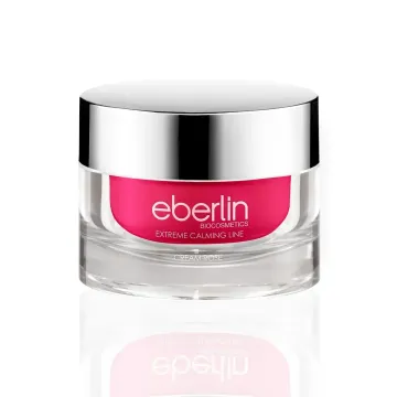 Un frasco de cosméticos ebelin con una etiqueta rosa