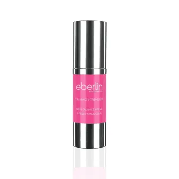 Una botella rosa de cosméticos eberlin sobre un fondo blanco
