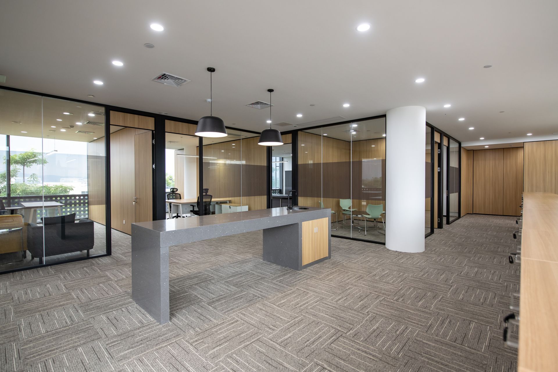 An artist 's impression of an office with a table and chairs.