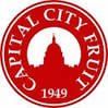 The logo for capital city fruit is a red circle with a white circle in the middle.