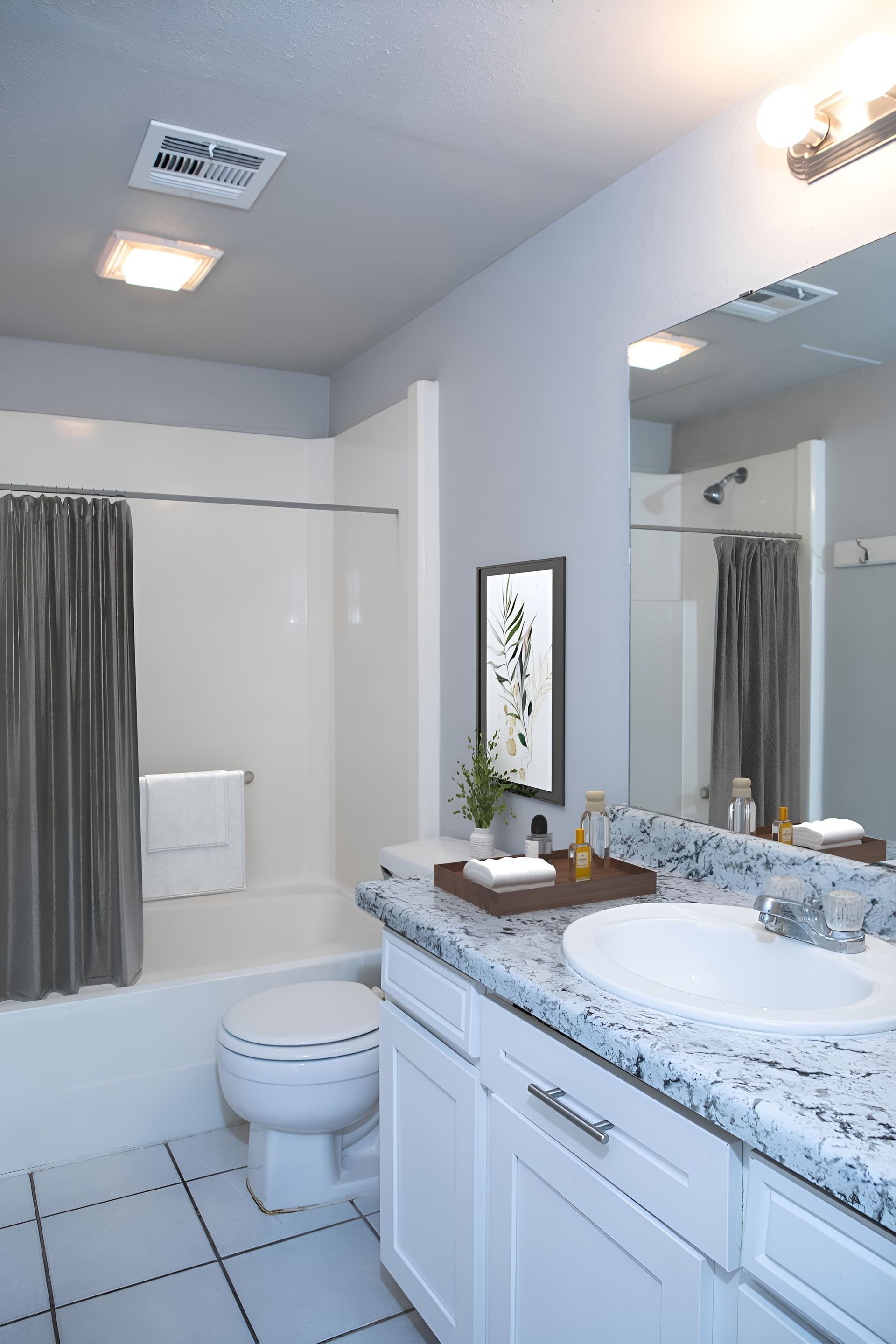 a bathroom with a sink toilet and bathtub