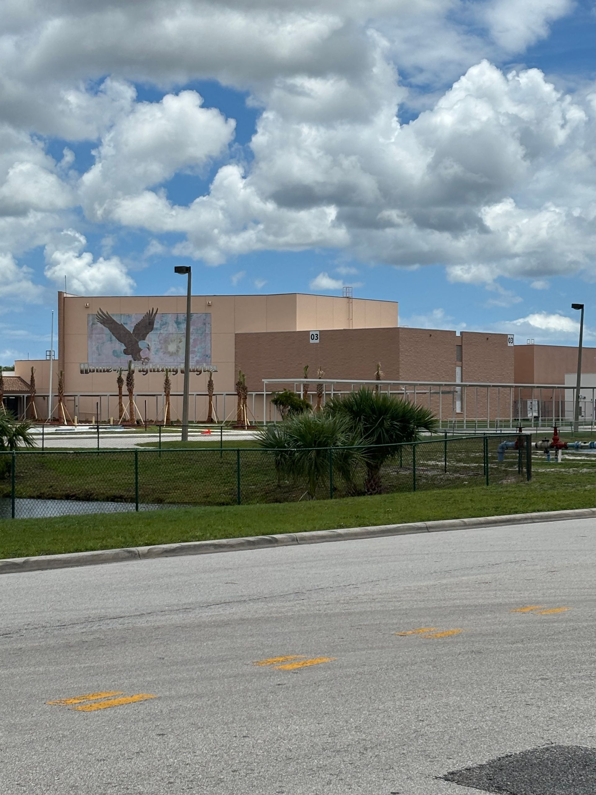 A large building with an eagle on the side of it