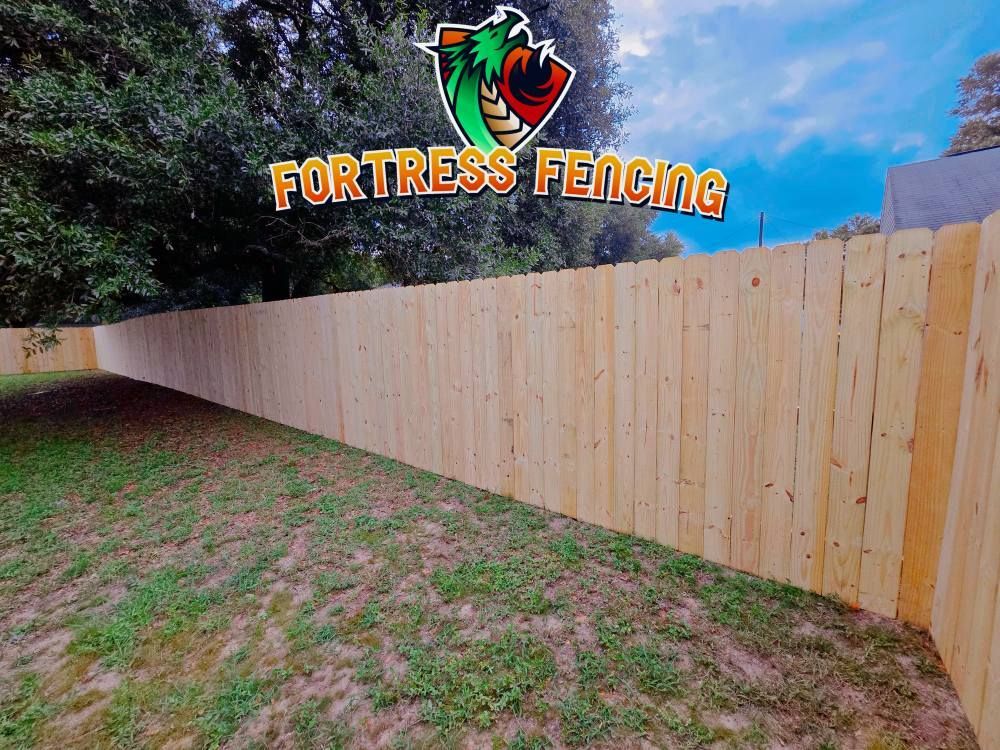 Wooden fence in backyard with