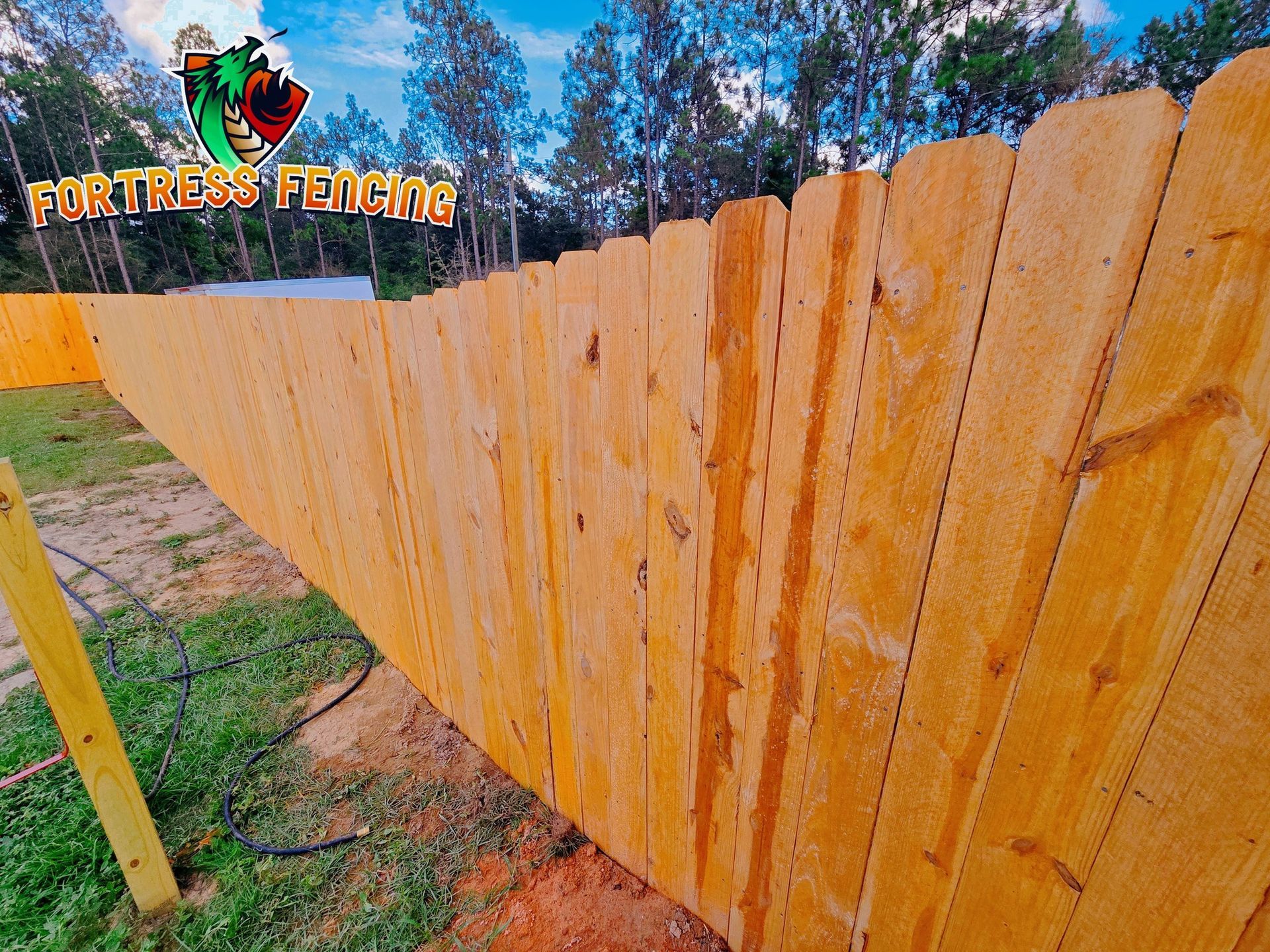 Wooden fence in a yard with