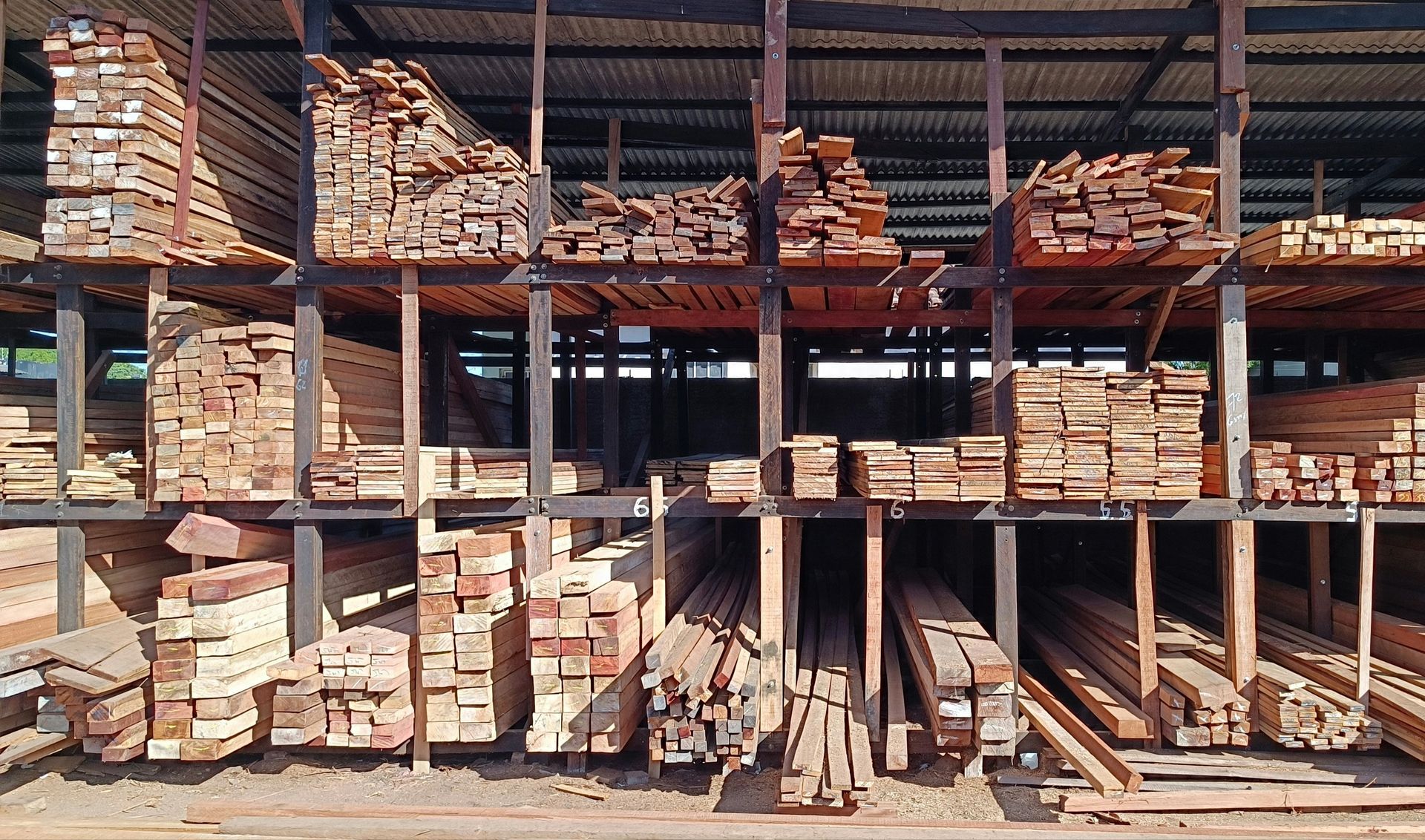 A warehouse filled with lots of different types of wood