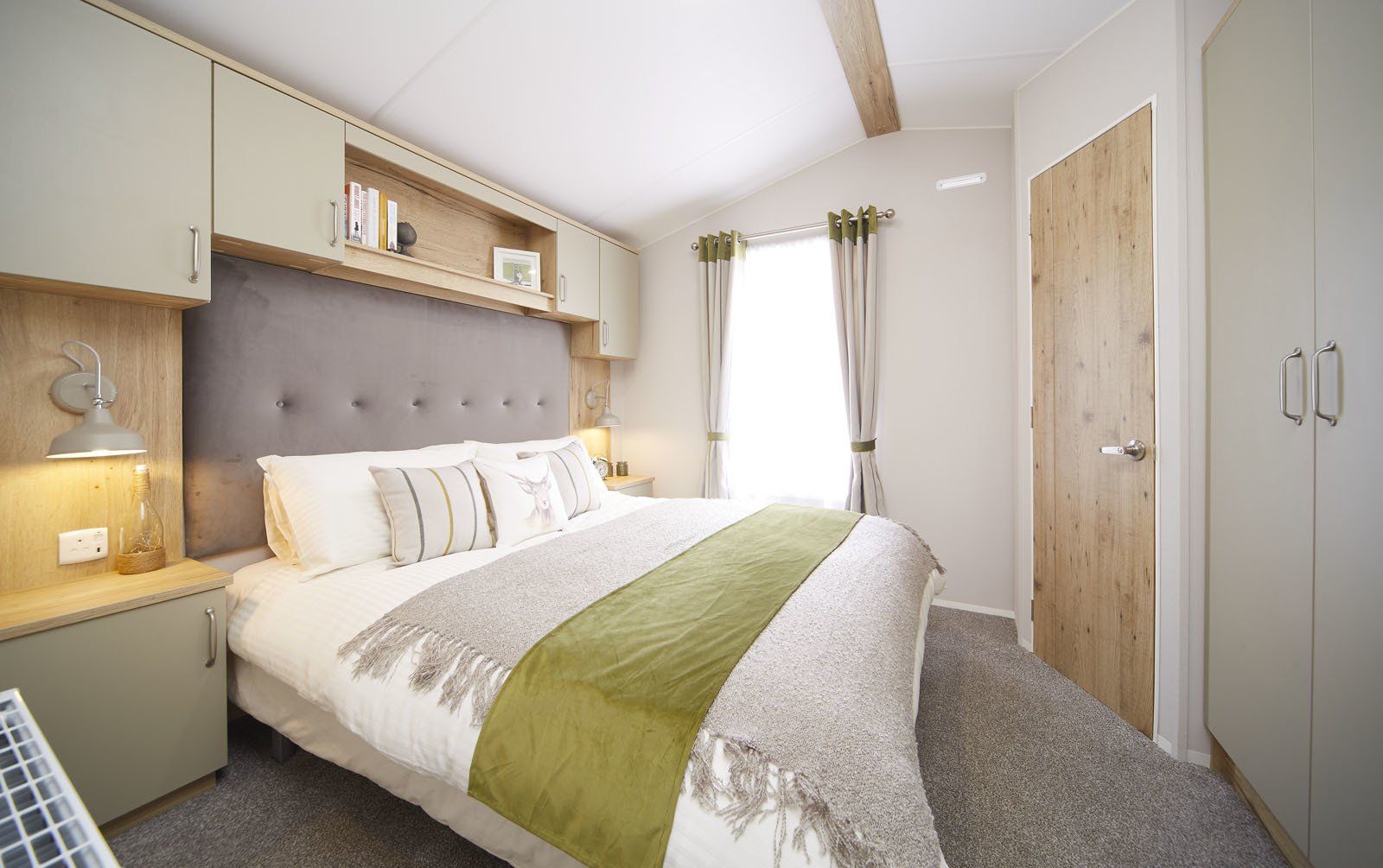 There is a large bed in the middle of the room.