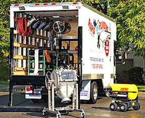Rapid Plumbing OC open truck image (sewers & drains page)