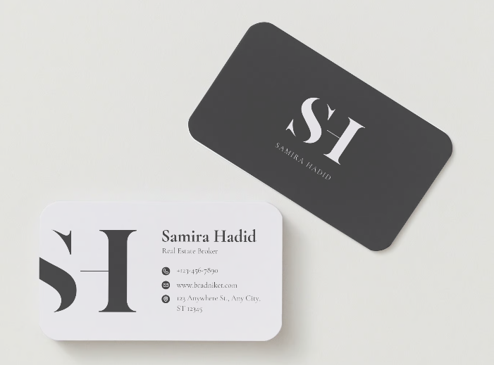 A black and gold logo for luxury architecture