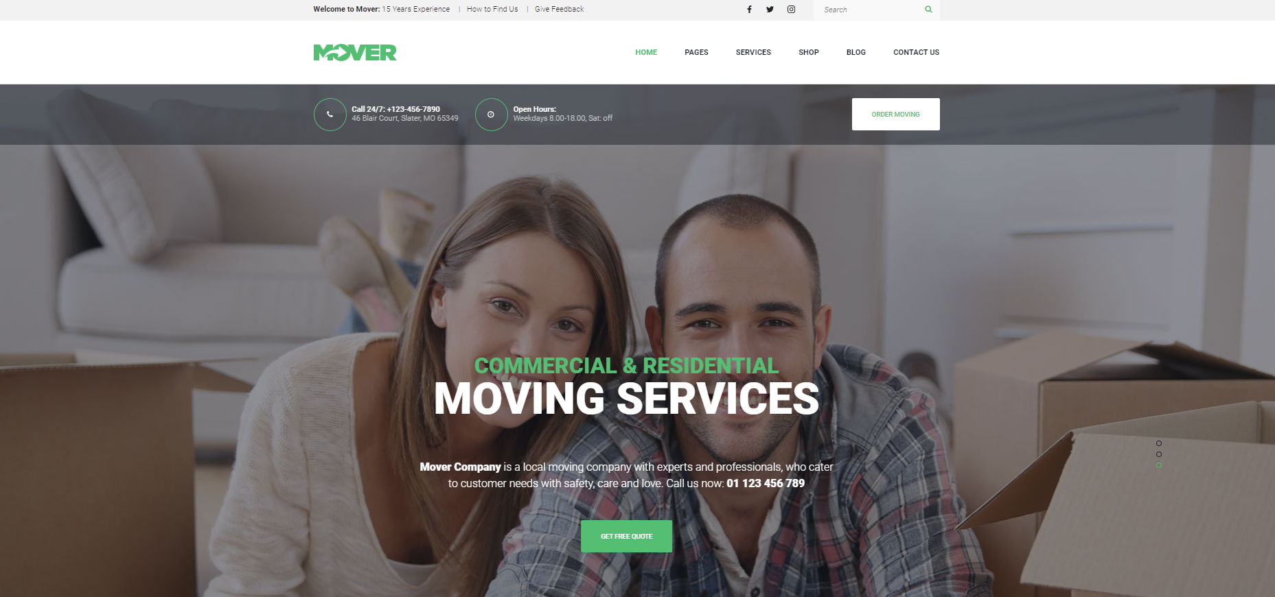 A man and a woman are sitting on a couch with moving boxes.