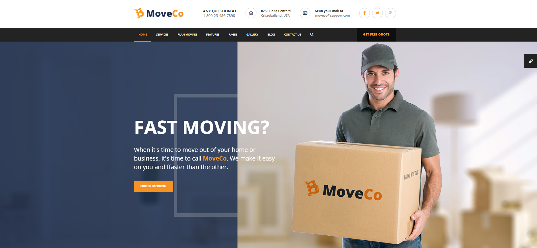 A man is holding a cardboard box in a living room.