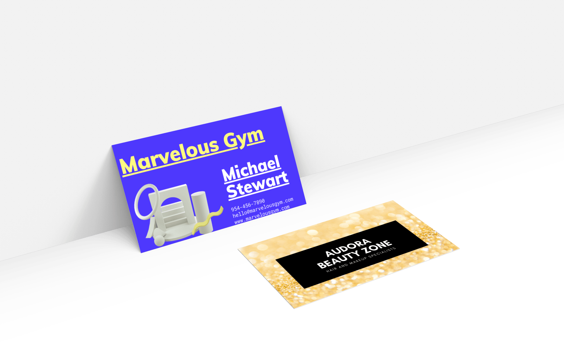 A business card for marvelous gym is sitting on a white surface.