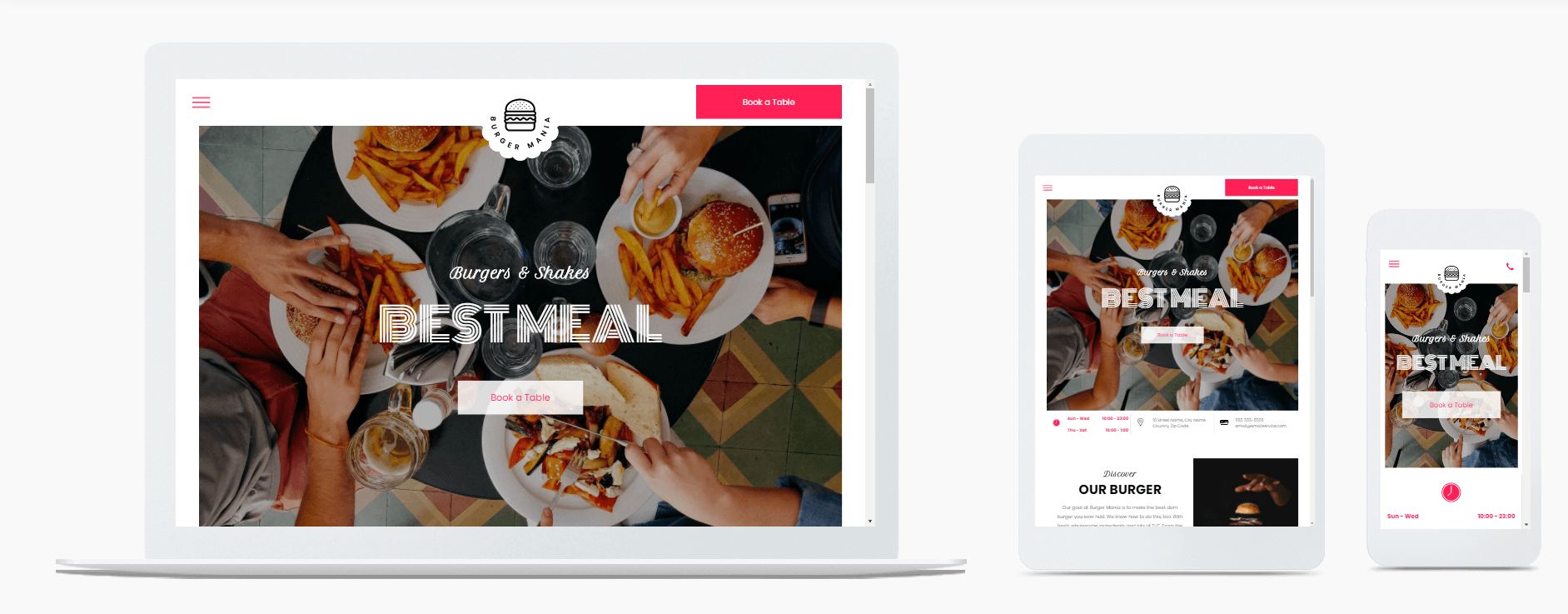 A group of people are sitting at a table eating food.