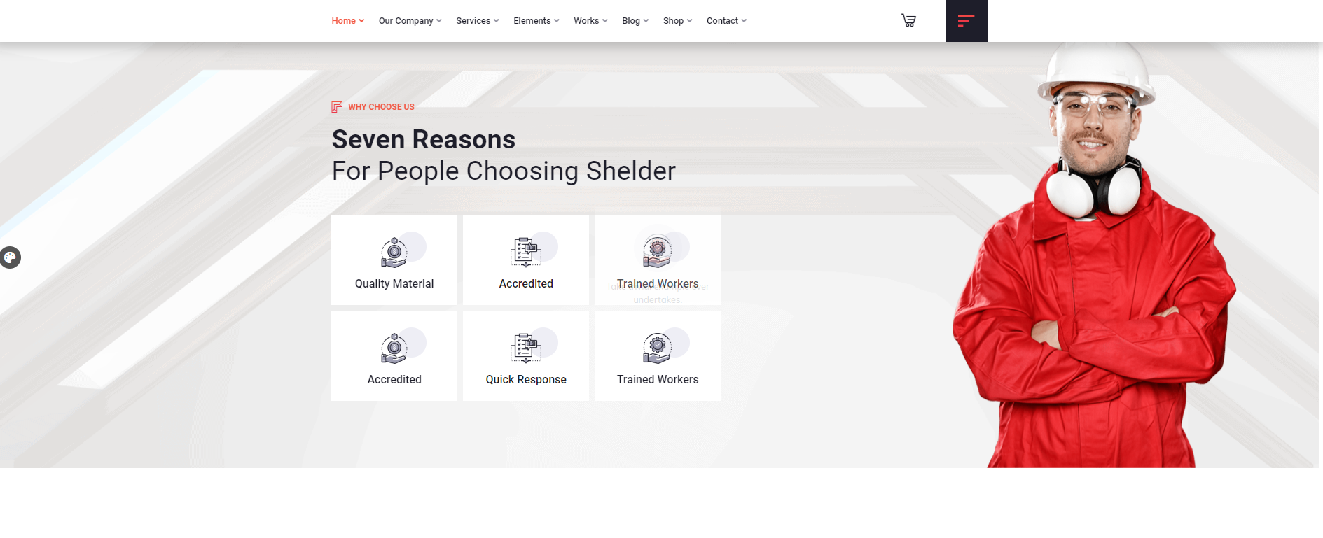 A man in a red jacket and hard hat is standing with his arms crossed.