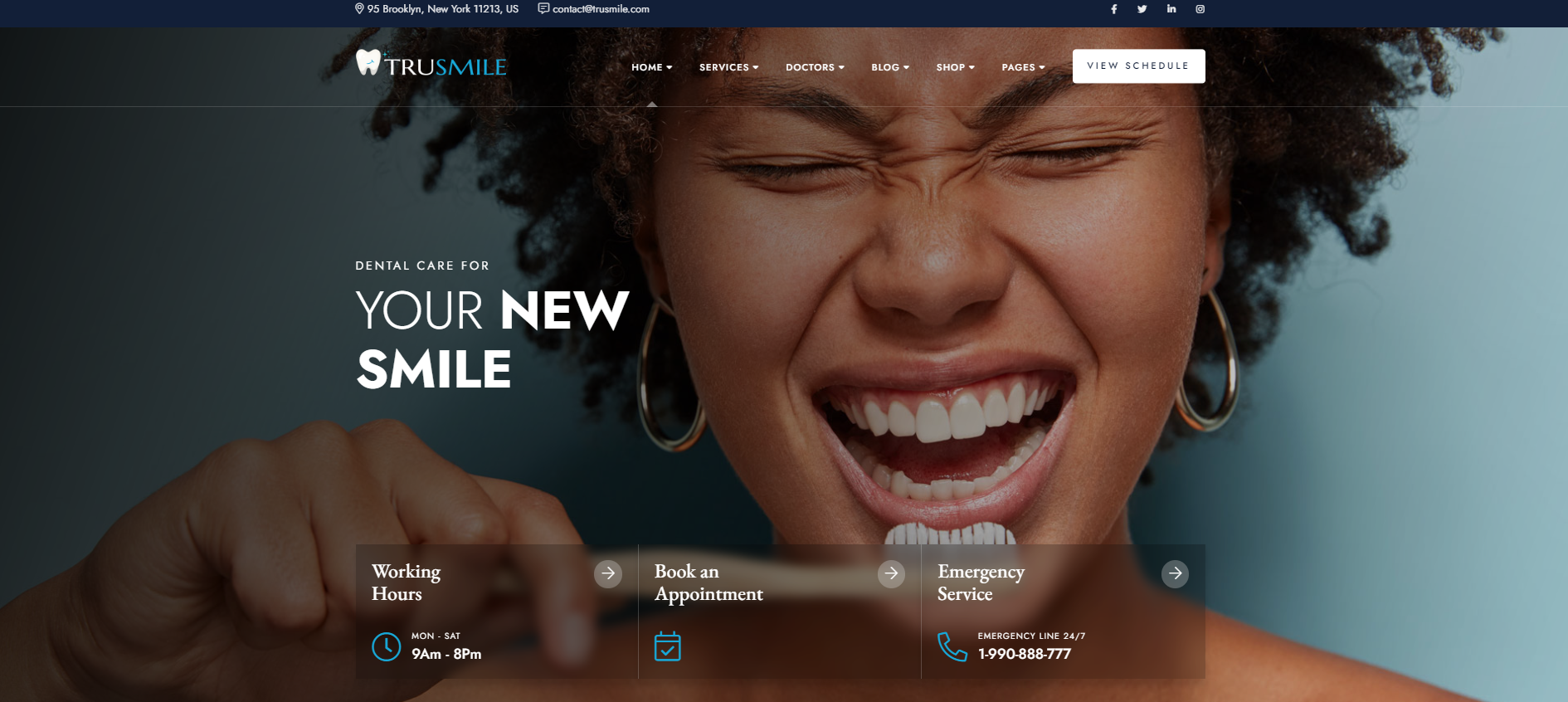 A woman is brushing her teeth with a toothbrush and smiling.