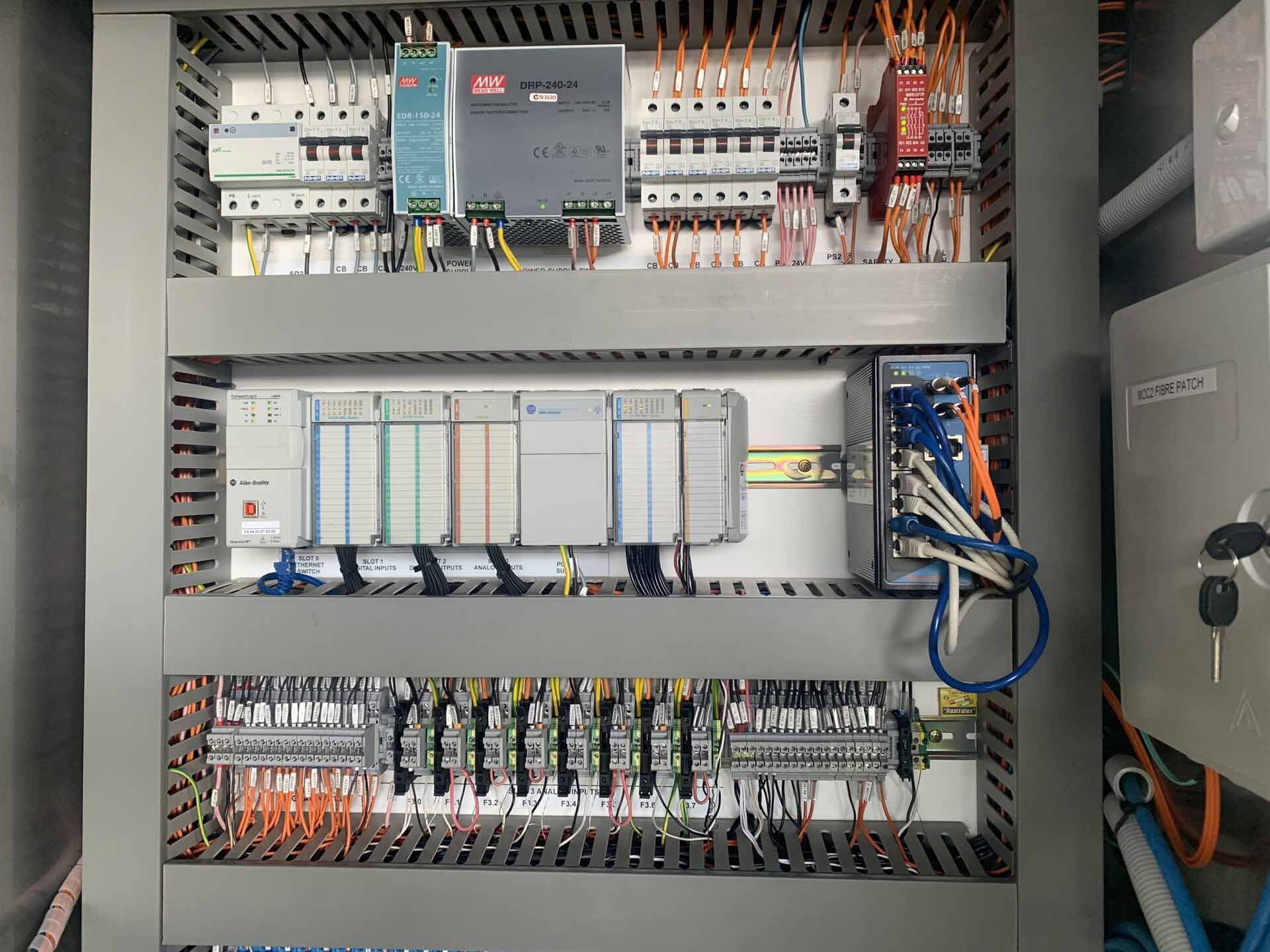 A Close up Of a Control Panel with A Lot of Wires Coming out Of It — A & J Electrical Contractors in Taminda, NSW