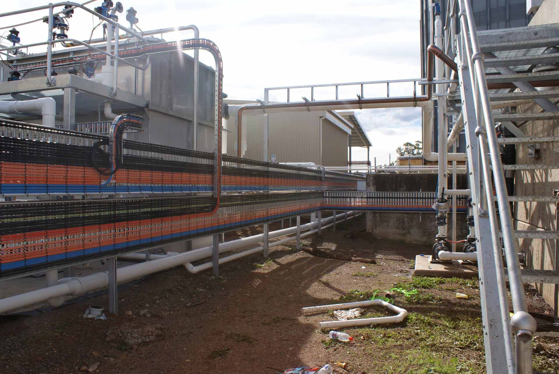 A Factory with A Lot of Pipes and Stairs — A & J Electrical Contractors in Taminda, NSW