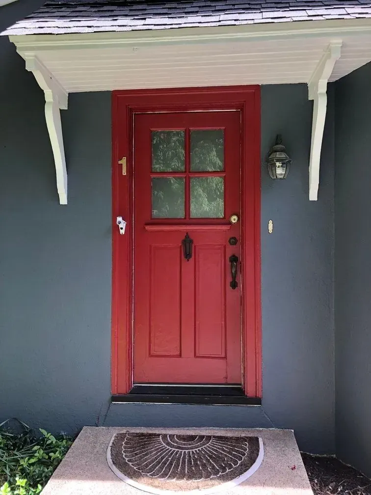 A red door with the number 1 on it