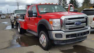 Red Wrecker with vehicle - Residential Towing in Astoria, OR