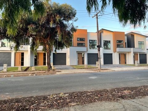 Village Row Dwelling With Wood — Adelaide, SA — Coastal Living by Design