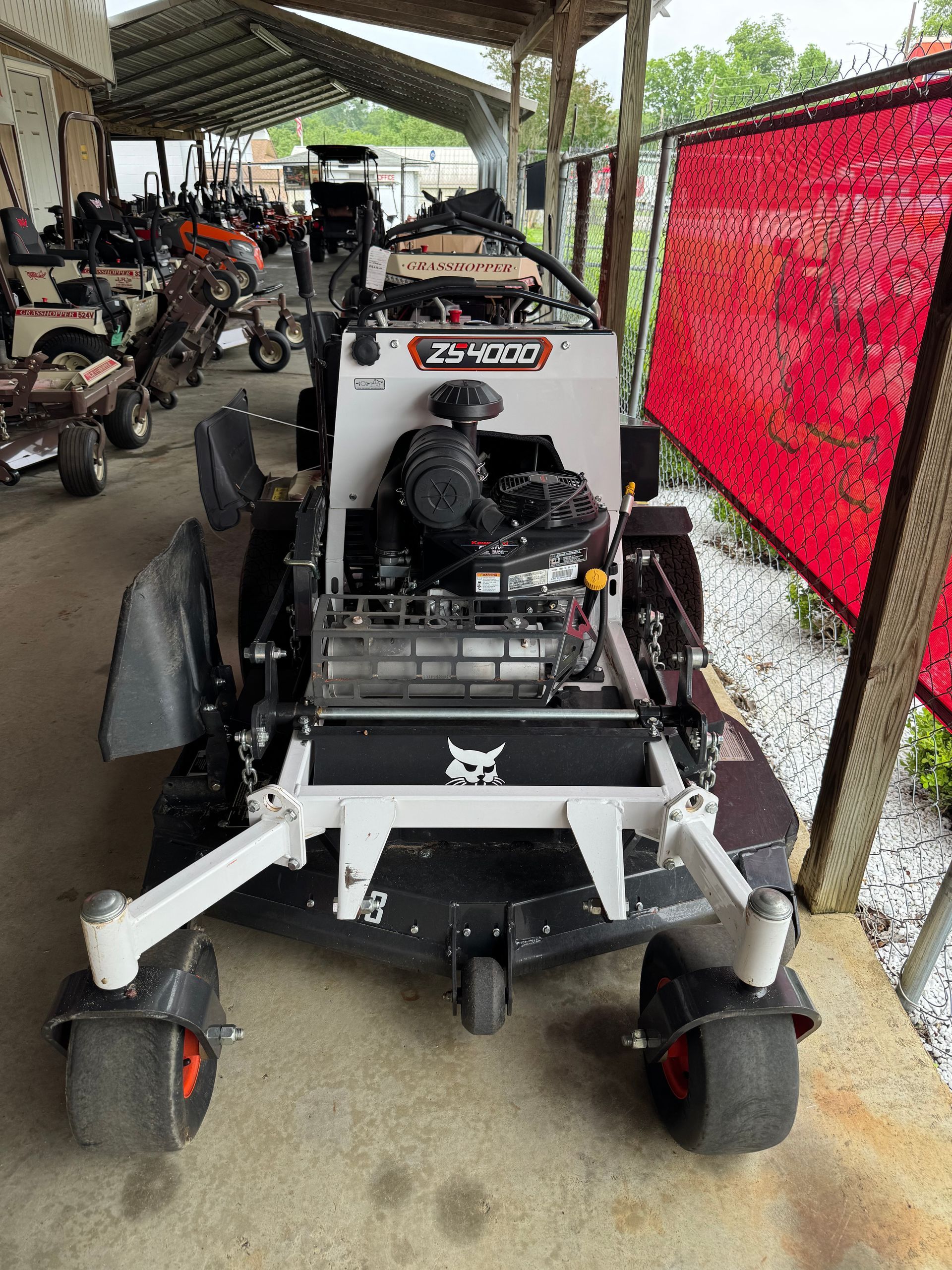 USED BOBCAT STAND ON MOWER