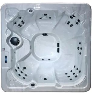 White square hot tub, multiple seats, jet nozzles, control panel, top-down view.