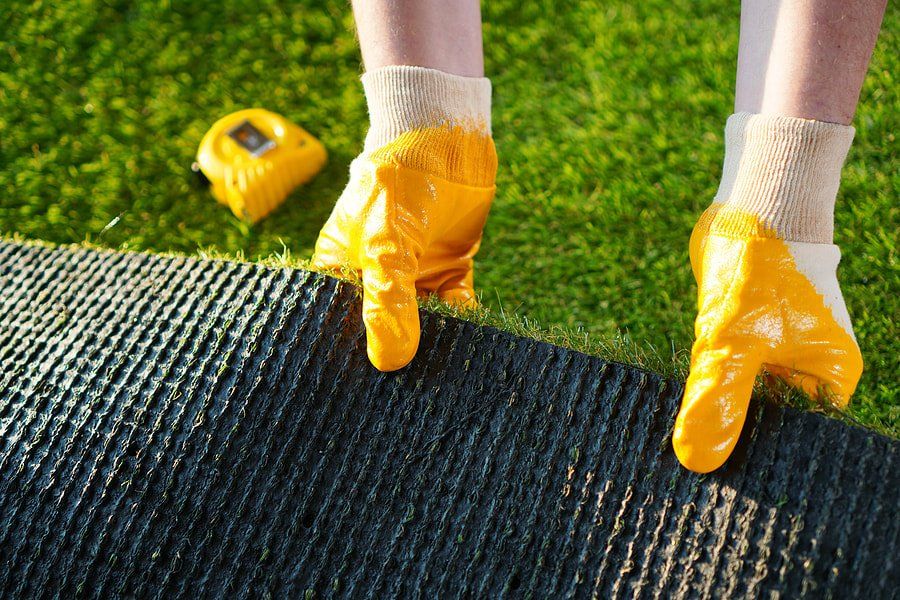 artificial lawn being installed in Leicester