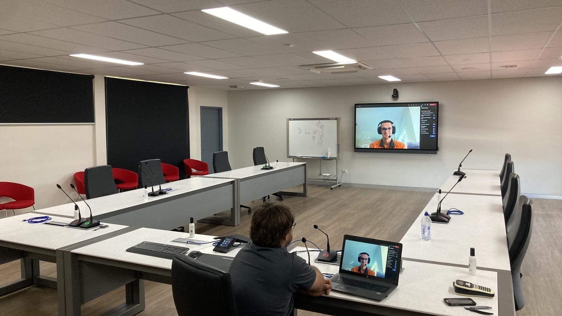 A Large Screen Displays Another Participant — Jendata In Charters Towers, QLD