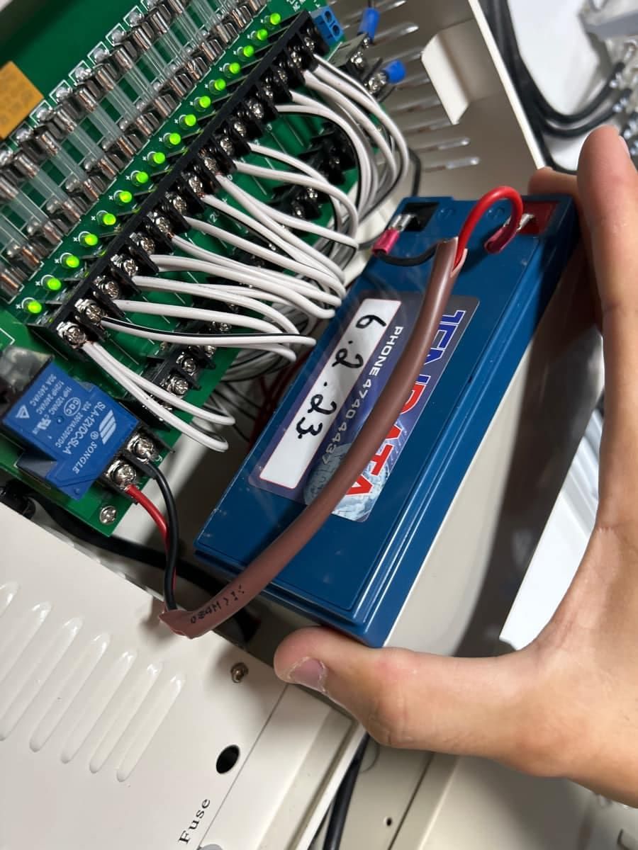 A Person is Holding a Battery With the Number 6.3 on It — Jendata In Garbutt, QLD