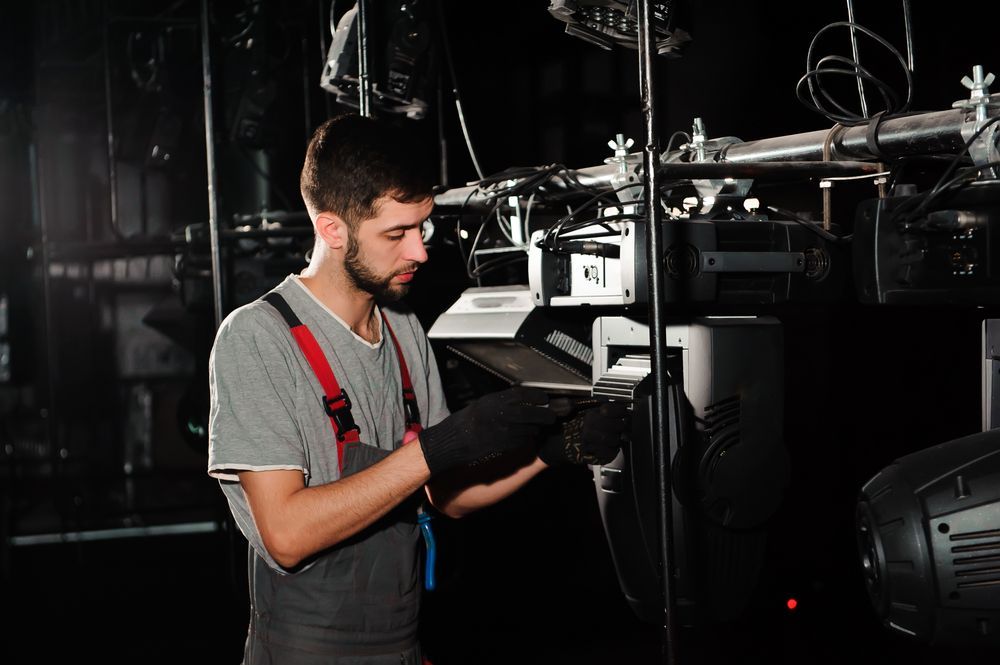 Technician in Grey Overalls and Black  — Jendata In Douglas, QLD