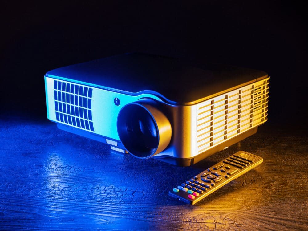 Projector With Remote Control, Lit by Blue and Yellow — Jendata In Ingham, QLD